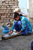 Jasvir washing cloths in the cold!
